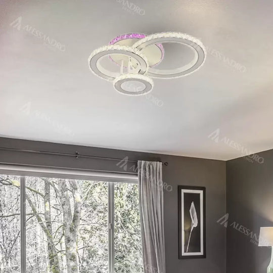 Żyrandol LED z pilotem i kryształem LEOCADIA RGB 134W, 3 koła, światło zimne/ciepłe/neutralne, możliwość przyciemniania, żyrandol LED z białego kryształu Domyślny tytuł Alessandro Design