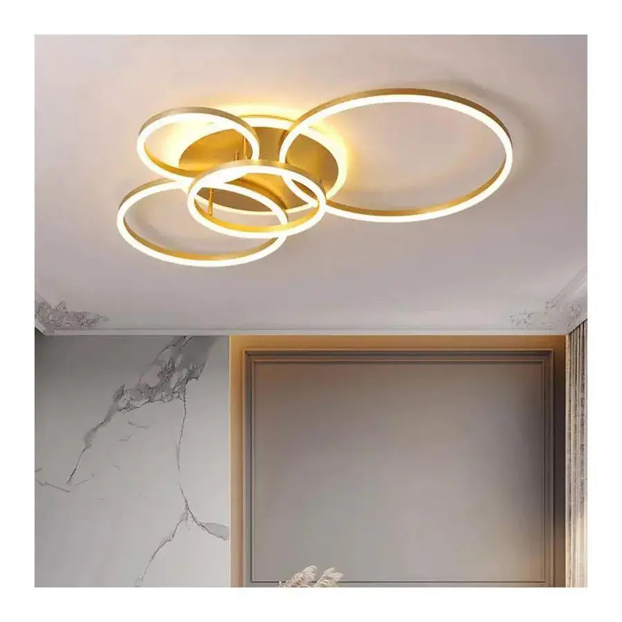 Żyrandol LED z pilotem LYRA 220 W, 4 okręgi, światło zimne/ciepłe/neutralne, ściemnialny, szczotkowane złoto
